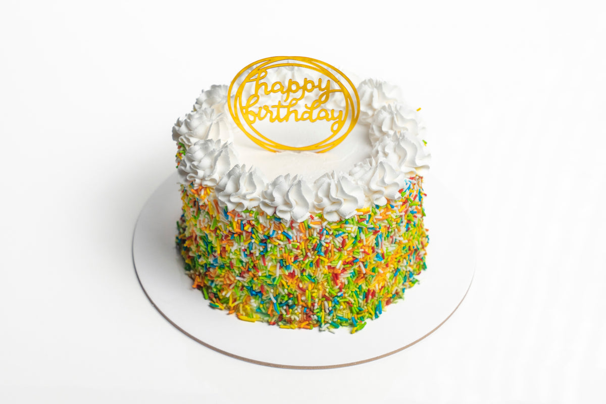 Festive Rainbow Sprinkles Cake